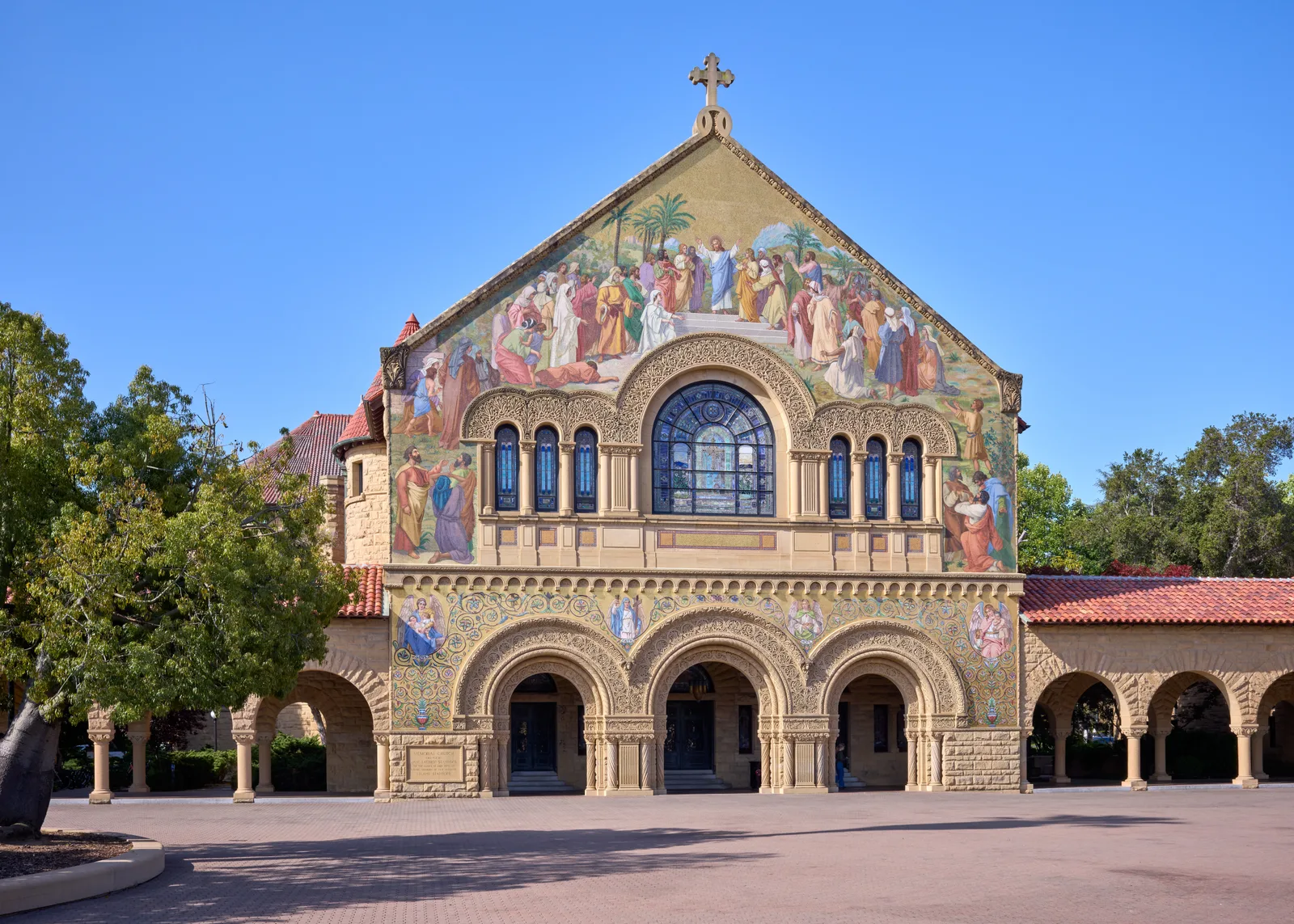 Stanford Memorial Church on the Main Quad, its mosaic façade lit by the sun.